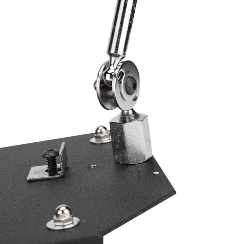 Close-up of Pro Grade Sturdy Welding Table Clamp With 360 Degree Adjustable Arms, showing the steel clamp and adjustable joint.