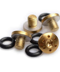 Elevate Your Sig P238 And P938 Grip Game With These Tough As Nails Stainless Steel Screws, Featuring A Slick Gold Finish, Heavy Duty Build, Plus Four Spare O Rings And A T10 Torx Driver For A Flawless Tight Fit. Close-up view of gold stainless grip screws and black O-rings.