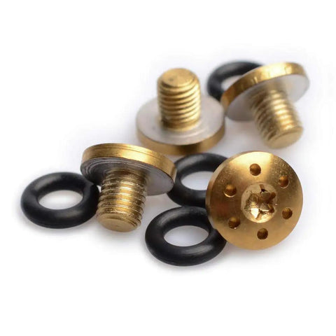 Elevate Your Sig P238 And P938 Grip Game With These Tough As Nails Stainless Steel Screws, Featuring A Slick Gold Finish, Heavy Duty Build, Plus Four Spare O Rings And A T10 Torx Driver For A Flawless Tight Fit. Close-up view of gold stainless grip screws and black O-rings.