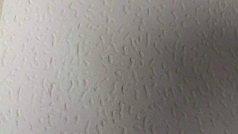 Close-up view of Tivoli Textured 12x12 Ceiling Tiles 32 Pack, Wood Fiber Panels, Medium Texture surface detail