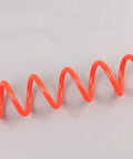 Hella Durable Coiled Air Compressor Hose Built Damn Tough With Single Layer Polyurethane And Oil Resistant Build Featuring Rock Solid Bend Restrictor Fittings And Seamless Swivel Ends That Guarantee Zero Kink Performance, bright red coiled hose