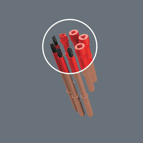 Close-up of KK VDE 60i/7 insulated interchangeable blade tips, red and brown plastic, part of 7-piece set for electricians