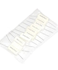 Ten white cement power resistors with metal leads in clear plastic packaging.