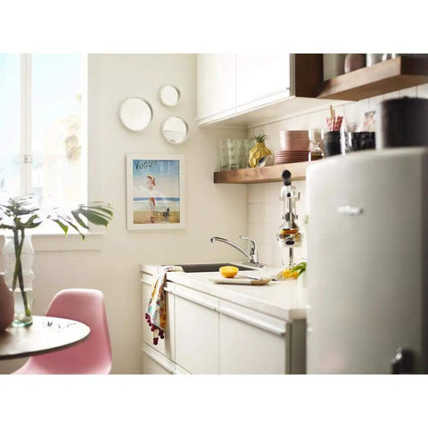 Refurbished Single Handle Faucet Kit LL in a bright kitchen setting, chrome finish visible, ready for easy DIY installation.