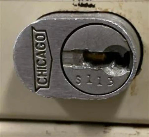 Heavy Duty Office Cabinet Replacement Key For S110 Core Fits Desk Drawers And Modular Cubicle Locks Genuine Oem Brass Hardware No Fuss Setup Slides Like A Charm For Daily Grind Use - close-up of Chicago lock with S110 core.