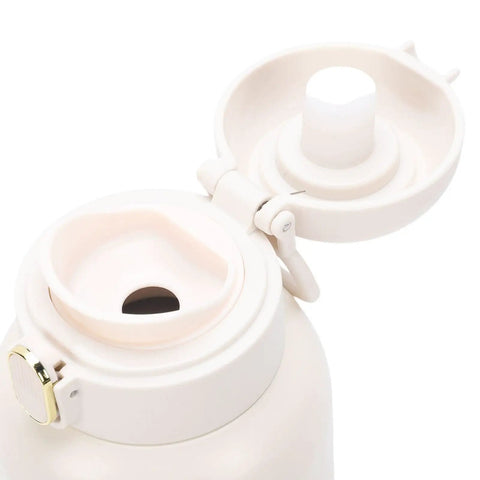 Top Shelf Portable Milk Warmer With Hella Quick 50W Heating Cordless Rechargeable Baby Bottle Heater Featuring Smart Constant Temperature Control For Travel And Outdoor Adventures open lid showing easy pour spout