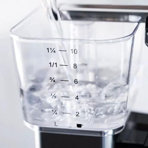 Stainless Steel Drip Coffee Maker With Thermal Base Keeps Coffee Hot For Hours Analog Hand Brewed No Fuss Automatic Filter Coffee Machine 1.25L Clear Water Level Display Durable Home Brewer with water being poured into the clear water level display.