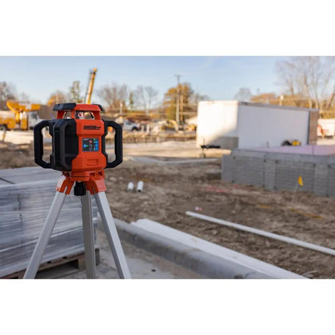 Jobsite Ready Self Leveling Red Dual Slope Rotary Laser System With 4,000 Ft Range on tripod at construction site