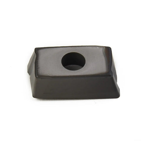 Close-up of APKT1604PD R76 IC928 carbide insert for CNC turning in steel machining, emphasizing high grip and precise cuts.