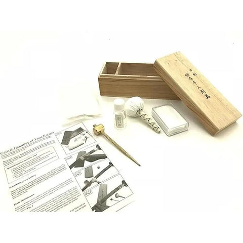 All In One Blade Cleaning And Maintenance Kit For Japanese Sword Care with choji oil, uchiko ball, and brass tools displayed