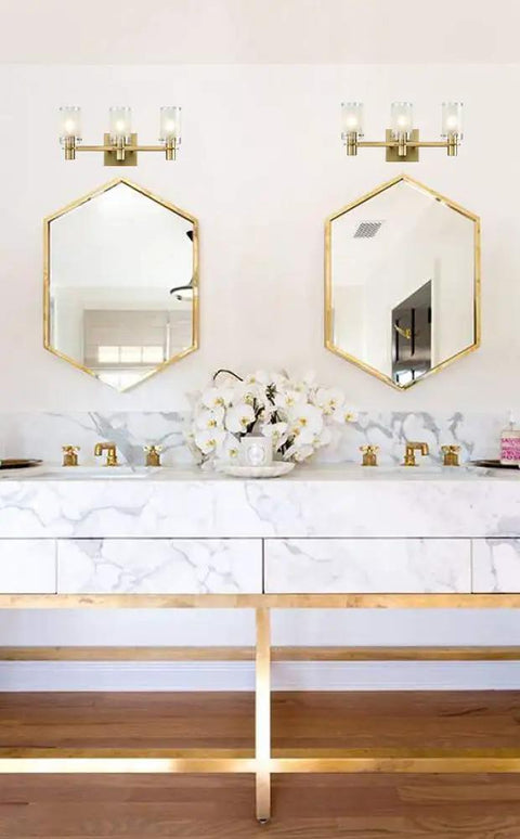 Three Light Vanity Wall Sconce with Explosion-Proof Frosted Glass Shade above modern bathroom mirrors