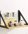 Heavy Duty Corner Brackets For Wall Mounted Shelves 90 Degree Steel L Braces 2 Pack holding bottles and jars on wood shelf