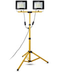 Ultra Bright 10000 Lumen Dual Head LED Work Light With 14 Ft Power Cord 6000K Daylight White IP66 Waterproof Adjustable Metal Tripod Up To 63 Inches For Indoor Outdoor Jobs. Yellow tripod and dual LED heads with visible cord.