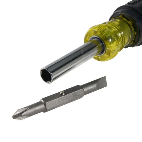 Close-up of Five In One Screwdriver And Nut Driver With Cushion Grip And End Mark, showing interchangeable bit and metal shaft.