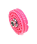 Close-up of pink injection molded pulley in Built Tough Window Regulator Repair Cord Kit for BMW E39 1996-2004.