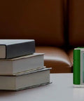 True Power Meter That Tracks Voltage And Phase For Higher Accuracy No Wifi Required displayed next to a stack of books on a table.