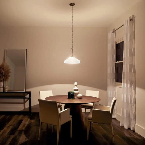 Dining room with Swanky 15 Inch One Light Pendant in Satin Etched Glass with Brushed Nickel Finish over table