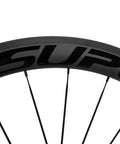 Close-up of 50/25mm UD Matte Finish Carbon Wheelset For 700c Tubeless Ready Black Road Bike With V Brake Compatibility Shimano 8 To 11 Speed.