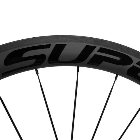 Close-up of 50/25mm UD Matte Finish Carbon Wheelset For 700c Tubeless Ready Black Road Bike With V Brake Compatibility Shimano 8 To 11 Speed.