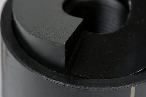 Close-up of Slug Splitting Conduit Punch Die for Hydraulic Knockout Driver Heavy Duty One And A Half Inch Fitting Size Nine Ton.