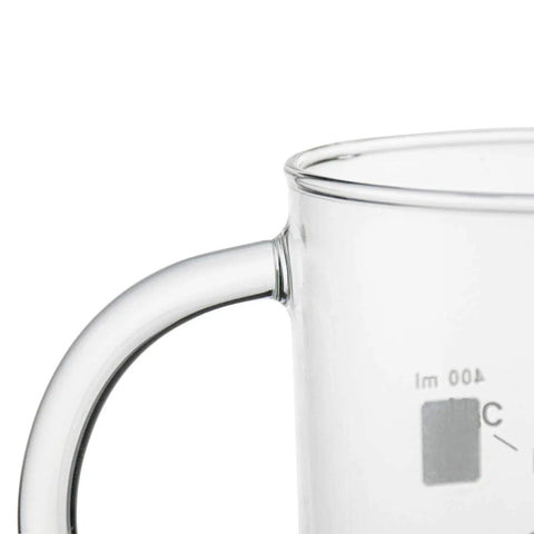 Close-up of handle on Two Pack Beaker Mugs With Handles, 16 Oz Caffeine Molecule Glass Coffee Cups, clear borosilicate graduated beaker mug.