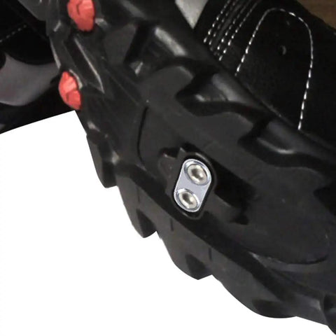 Close-up of Ride Ready Adjustable Stainless Steel Cleat Plates With Secure Fit Locking System on a cycling shoe sole