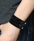 Two Piece Punk Leather Cuff Bracelet Set Vintage Wristband For Men And Women Adjustable Retro Biker Arm Band on wrist.