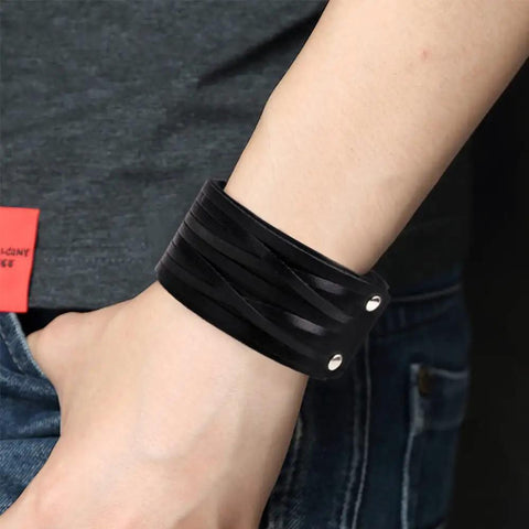 Two Piece Punk Leather Cuff Bracelet Set Vintage Wristband For Men And Women Adjustable Retro Biker Arm Band on wrist.