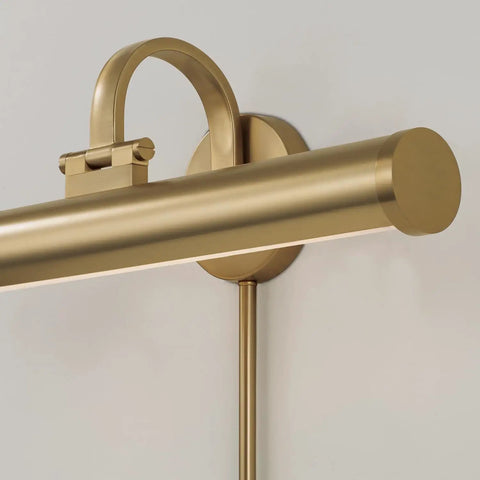 Close-up view of Capital Lighting 658211MA Morgan Wall Sconce Photo Light in matte brass, showcasing integrated LED and sleek design.