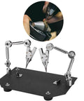 Pro Grade Sturdy Welding Table Clamp With 360 Degree Adjustable Arms, Third Hand Tool, viewed with steel arms and anti-slip base.