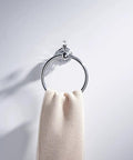 Chrome Towel Ring With Crystal Ball Accents, Polished Hand Towel Holder mounted on wall holding beige towel in modern bathroom.