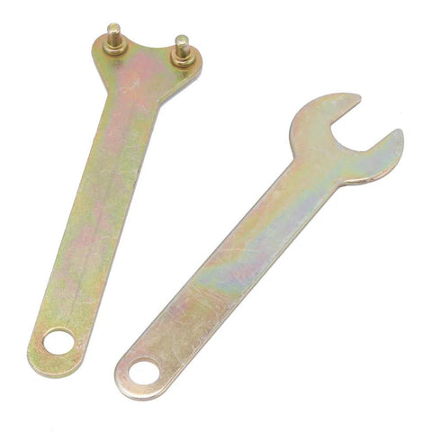 Angle grinder chuck kit wrenches: two zinc-plated metal spanners, one with studded end and one open-ended.