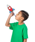 Color Your Own Air Rocket Craft Kit For Kids Ages 4 8 And Ten DIY Space Rockets STEM Fun That Totally Rocks Hands On And Creative Includes Pre Cut Cards Foam Shapes Pipettes And Straws boy blowing a colored paper rocket with straw