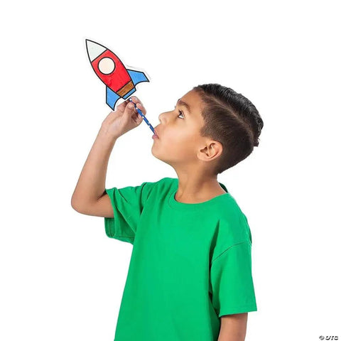 Color Your Own Air Rocket Craft Kit For Kids Ages 4 8 And Ten DIY Space Rockets STEM Fun That Totally Rocks Hands On And Creative Includes Pre Cut Cards Foam Shapes Pipettes And Straws boy blowing a colored paper rocket with straw