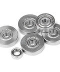 Chrome metal replacement bearings set for rabbet router bits; inner 3/16" and outer 3/8"–1-1/8" sizes.