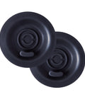 Close-up of two black 54mm silicone backflush discs for Breville espresso machines (2-pack)