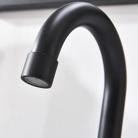 Close-up of Matte Black Bathroom Sink Faucet With Widespread 8 Inch 3 Hole Vanity Fit, 360 Degree Swivel Spout.