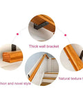 Heavy Duty Wood Stair Handrail With Tough Wrought Iron Brackets For Secure Grip And Hassle Free Wall Mount 600cm Support Bar close-up of thick wall brackets and wooden texture.