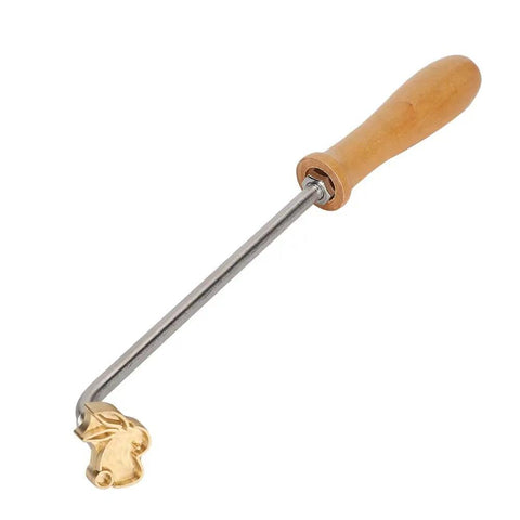 Top Shelf Molding Machine For Smooth Wood Bread And Leather Stamping with wooden handle and brass head for crafting.