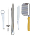 Norpro 5-piece garnishing tool set for fruit and vegetables; stainless steel blades with white plastic and wooden handles