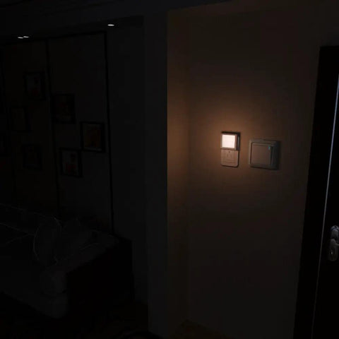 Plug In Dimmable LED Night Light With Auto Dusk To Dawn Sensor Soft Warm White in hallway at night, 4 pack shown.