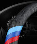 Close-up of BMW Nappa Leather Steering Wheel Cover Slim Fit With Three Color Stripe Design, showing breathable perforations and vibrant stripes.