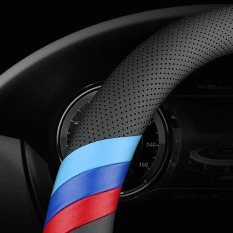 Close-up of BMW Nappa Leather Steering Wheel Cover Slim Fit With Three Color Stripe Design, showing breathable perforations and vibrant stripes.