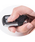 Person holding remote for Smart Wireless Anti Theft Door Lock Kit With Keyless Deadbolt Access Control System For Home Security