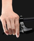 1 Pair Universal Aluminum Bicycle Brake Levers For Mountain Road Folding Bikes 22 Mm Clamp Diameter Lightweight Durable Replacement Parts Built To Last For Everyday City And Trail Rides, hand holding brake lever on bike handlebar.