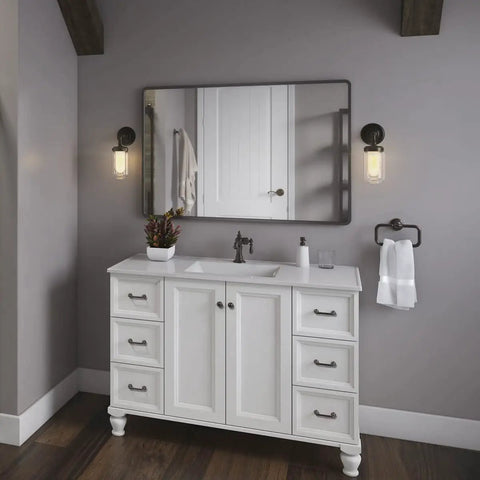 Artifacts Single Sconce With Dope Clear Glass Shades And Inner Frosted Diffusers mounted beside bathroom mirror