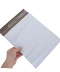Hand holding a Waterproof Poly Mailer Bag 10x14 Inches White Self Seal Envelope for Clothing against a white background