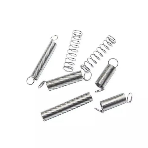 Heavy Duty Assortment Kit With 200 Stainless Steel Compression Springs For Home DIY Projects Plus Automotive Repairs And Mechanical Fixes Including Rust Proof And Durable Metal Coils In Various Sizes That Are Super Cool For Serious Tinkering And Building. Stainless steel compression springs in assorted sizes, close-up on white