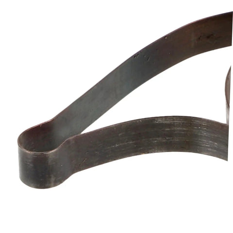 Close-up of steel Mechanical Clock Spring For Alarm Clocks DIY Repairs And Craft Projects Replacement Component High Quality Winder