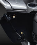 Fresh Gold Titanium Handlebar Clamp Bolts And Brake Clutch Perch Screws mounted on a Harley motorcycle, showcasing premium build quality.